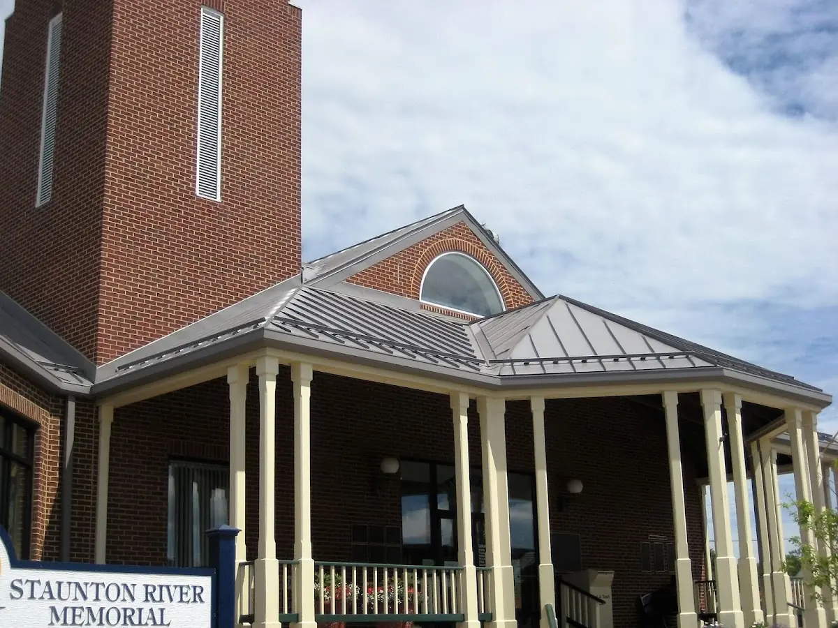 Skilled roofing craftsmen working on a residential roof in Hickory Ridge